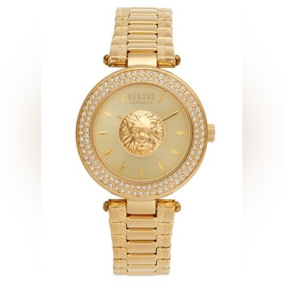 Versace very attractive Gold tone watch new never used. Elegant and sexy.
